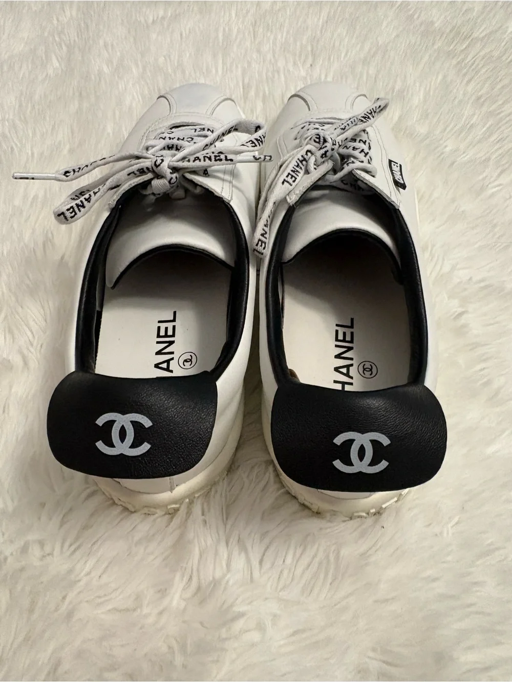 CHANEL White and Black Logo Lace-Up Sneakers